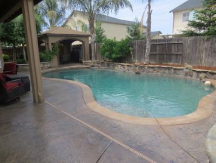 This is an image of concrete company in rocklin finished driveway resurfacing. 